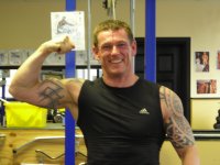 man flexing muscles