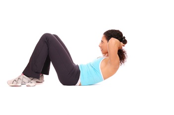 A woman doing situps