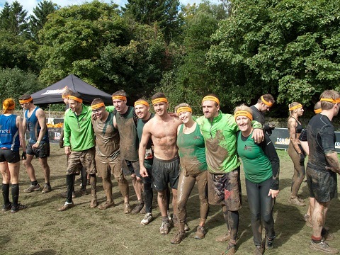 group of people completing tough mudder