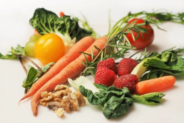 picture of organic fruits and vegatables on a white background