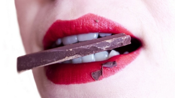 woman eating easter chocolate
