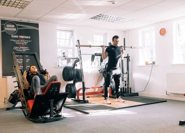woman and man training legs at local Ribble Valley gym
