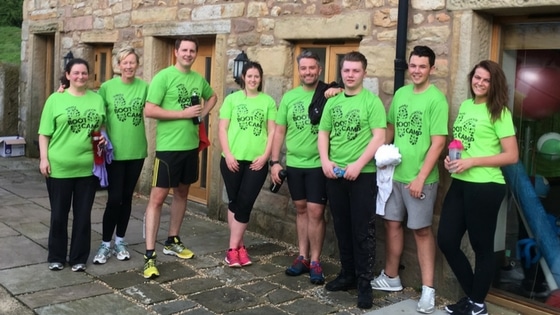 team of individuals doing team fitness